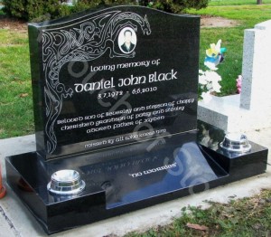 black marble tombstone